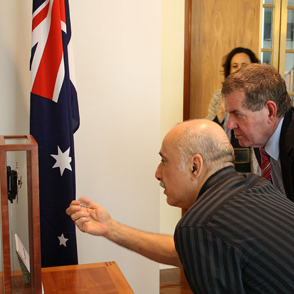 Discussing the features of the clock with Peter Slipper MP
